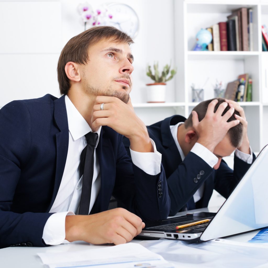 Business male assistants making leads mistake