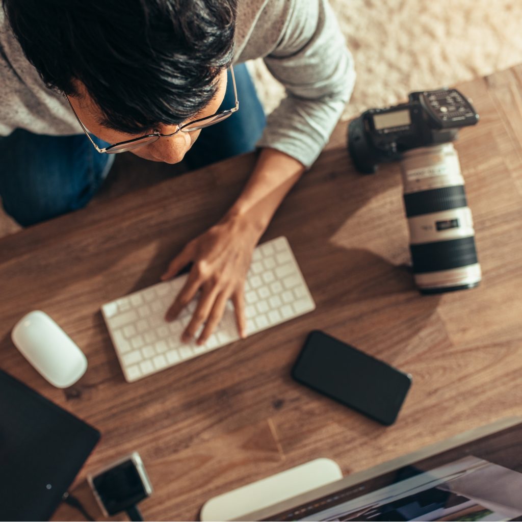 Photographer Editing Pictures after Shoot for LinkedIn Profile Update